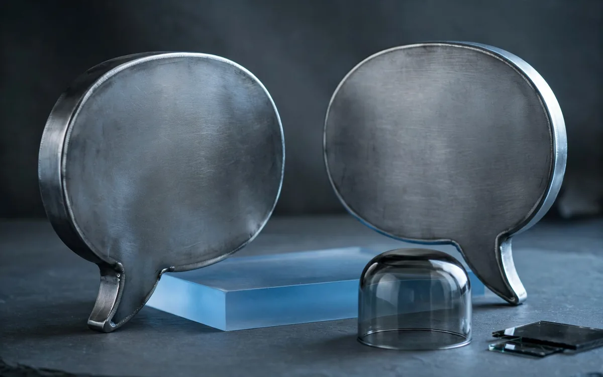 Conceptual metal and glass composition for business and privacy contact